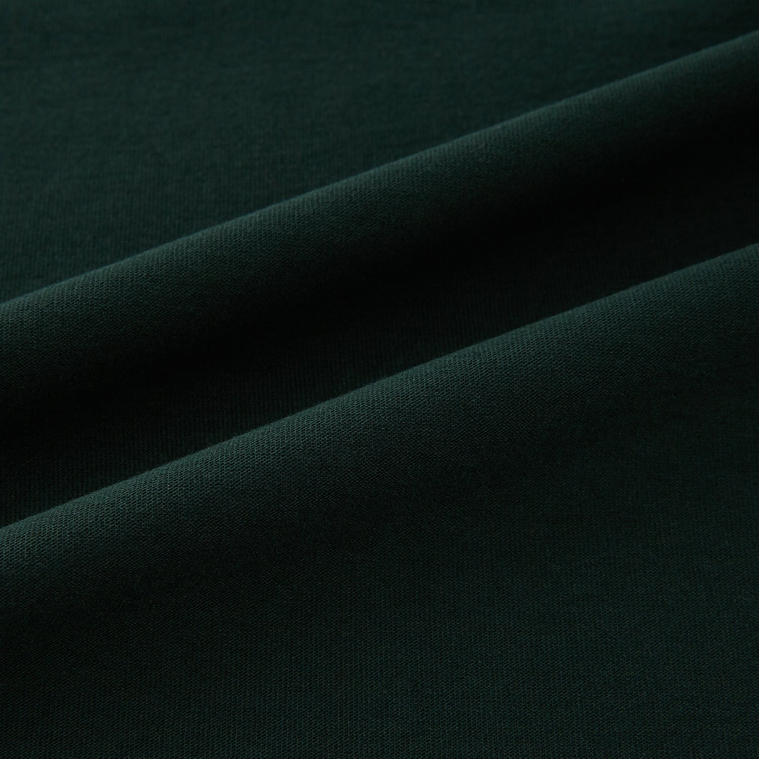 View 6 of product A forest green long-sleeve crewneck t-shirt by Turnbull & Asser is laid flat on a white background, showing the front side with no visible patterns or logos—a timeless, versatile staple.