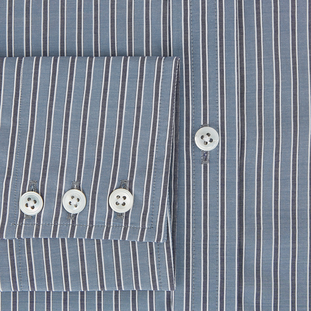The Steel Grey Ticking Stripe Mayfair Shirt by Turnbull & Asser is a long-sleeved, button-up shirt with a collar, crafted from fine Italian cotton and featuring slim steel grey and white stripes with white buttons for a classic touch.