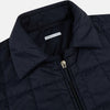 View 2 of product The Turnbull & Asser Battersea Navy Quilted Jacket features a versatile quilted design with a front zipper, zippered pockets, collared neckline, buttoned cuffs, and a subtle square pattern—perfect for the modern gentleman.