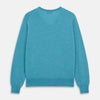 View 3 of product The Turquoise Kennedy Merino V-Neck Jumper by Turnbull & Asser features ribbed cuffs and hem, crafted from premium merino knitwear, and is shown flat on a white background.