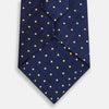 View 3 of product The Turnbull & Asser Navy and Gold Micro Dot Silk Tie showcases subtle herringbone texture with gold micro dots, offering a refined and modern look for the office.