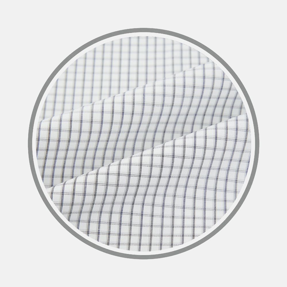 Close-up of Turnbull & Asser’s Midnight Blue Multi Check Fabric, featuring a grid pattern of evenly spaced thin black lines. Shown inside a circular frame, the fabric’s folds cast diagonal shadows on a plain background.