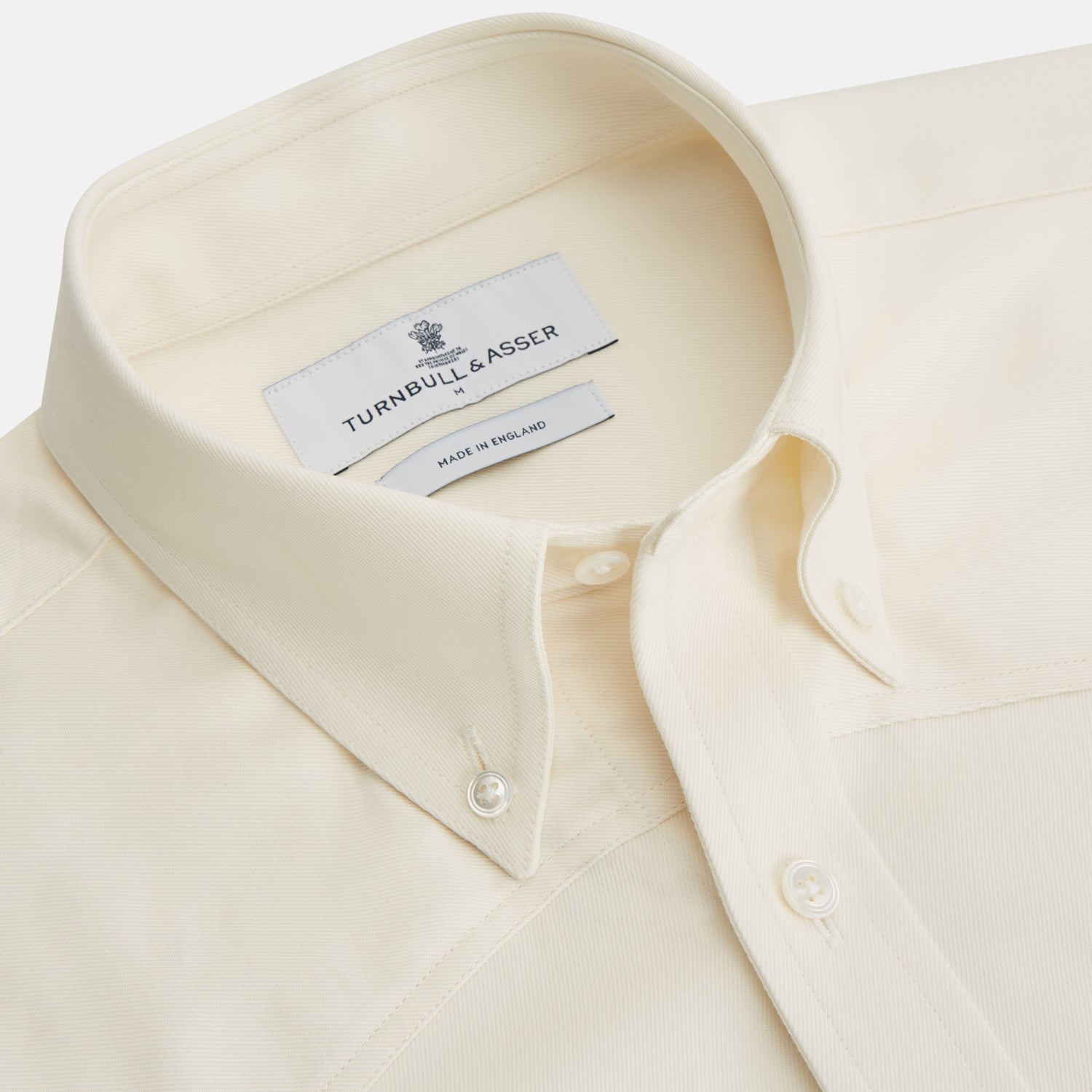View 5 of product The Cream Cotton Weekend Fit Western Shirt with Dorset Collar by Turnbull & Asser features two chest pockets and is laid flat on a white background—ideal for smart-casual style.
