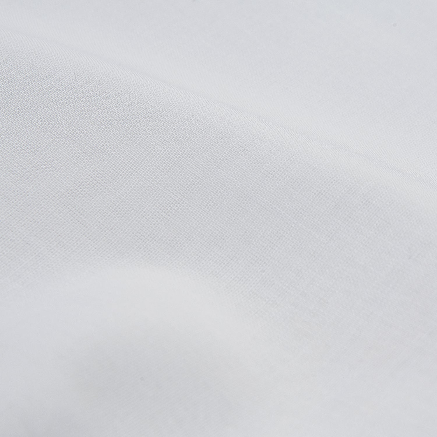 View 4 of product A neatly folded Die Another Day Inspired Voile Dress Shirt by Turnbull & Asser, featuring a classic collar and buttoned front, is displayed on a white background, evoking the timeless style of a James Bond shirt.