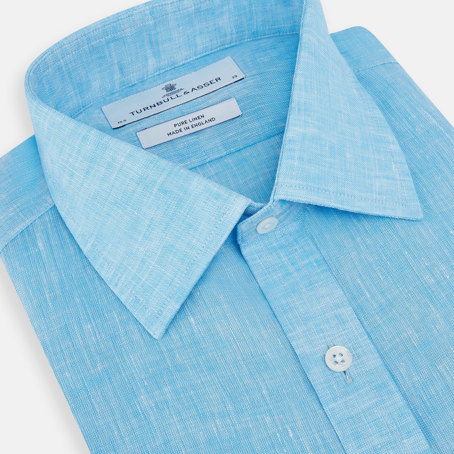 View 2 of product The Turnbull & Asser Turquoise Linen Mayfair Shirt features long sleeves and a collar, displayed neatly on a white background.