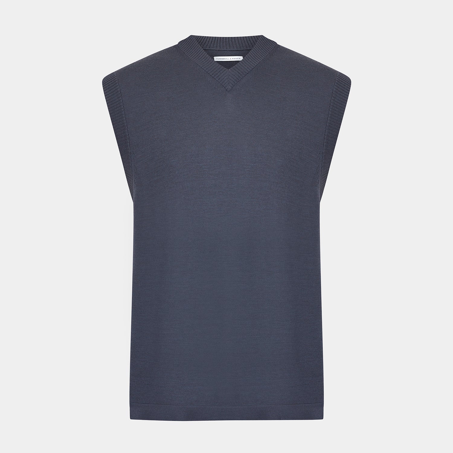 View 1 of product The Turnbull & Asser Grey Fine Merino V-Neck Vest, featuring a sleeveless design, is elegantly displayed against a plain white background.