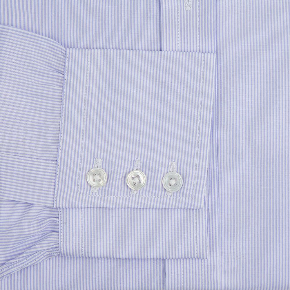 A Blue and White Fine Bengal Stripe Sea Island Quality Cotton Shirt by Turnbull & Asser, featuring a T&A collar and 3-button cuffs, is laid flat on a white background.