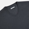 View 2 of product The Turnbull & Asser Charcoal Grey Merino V-Neck Jumper is shown against a white background, featuring long sleeves, a relaxed fit, and ribbed cuffs and hem for comfort.