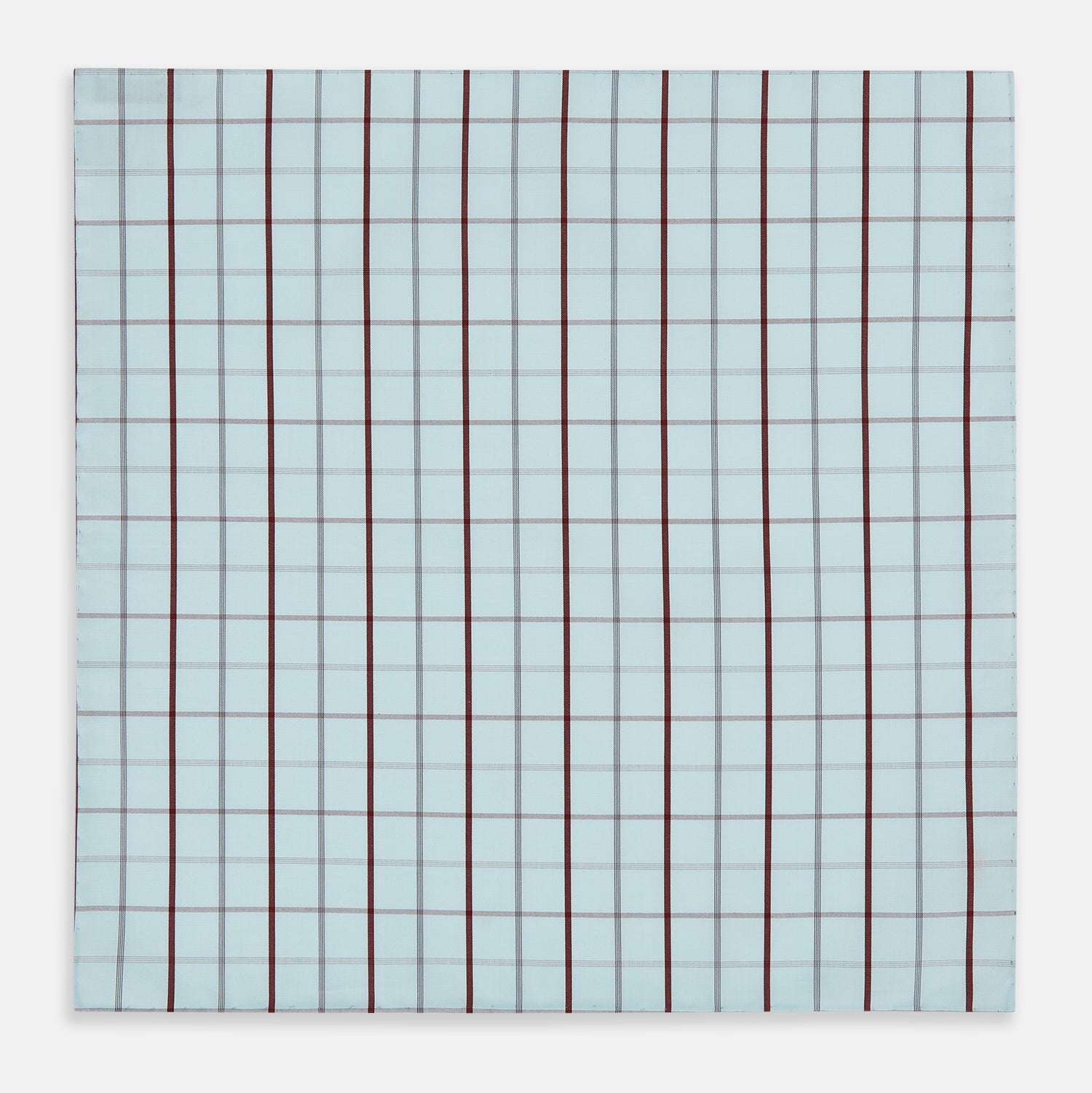 View 3 of product The Turnbull & Asser Burgundy Combination Check Hand-Rolled Handkerchief, featuring a light blue plaid with thin gray lines and bold dark red stripes, is displayed flat against a white background.