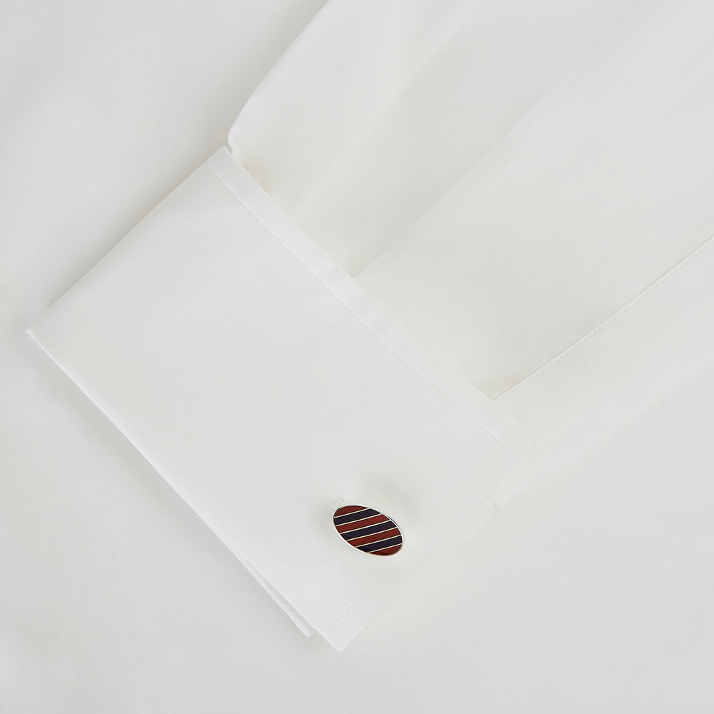 The Burgundy and Navy Striped Oval Enamel Cufflinks by Turnbull & Asser feature a silver oval design with bold stripes, adding a touch of masculine elegance to any ensemble.