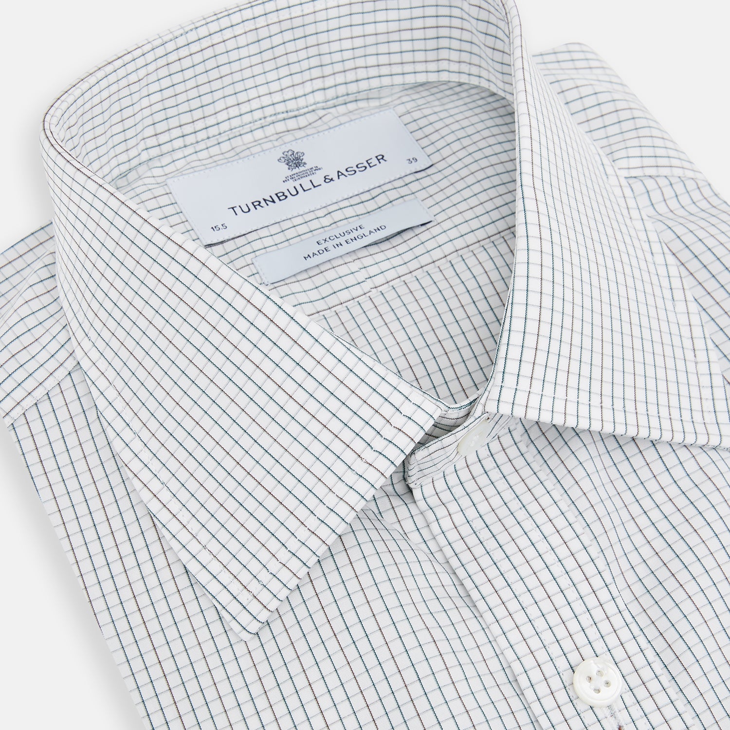 View 2 of product A Forest Melange and Red Graph Check Mayfair Shirt by Turnbull & Asser, featuring a classic T&A collar, button-down front, and buttoned cuffs, crafted from fine Italian cotton and shown on a plain white background.