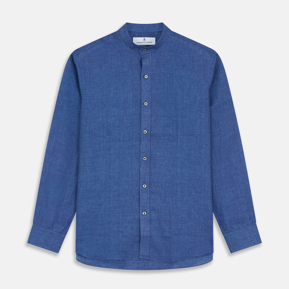 Close-up of Turnbull & Asser Navy Linen Fabric, highlighting its texture and weave pattern, displayed within a circular border against a plain white background.