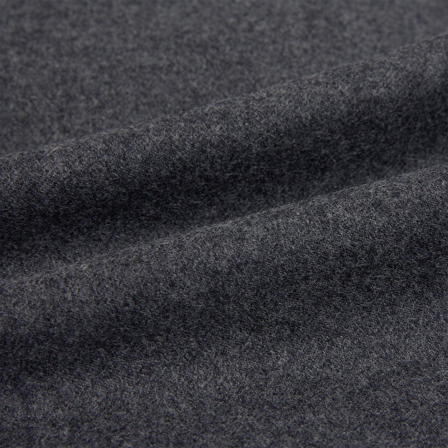 View 5 of product The Grey Highbury Overshirt by Turnbull & Asser is a long-sleeve, button-up charcoal gray overshirt with a single chest pocket, inspired by classic formal jackets and shown laid flat on a white background.