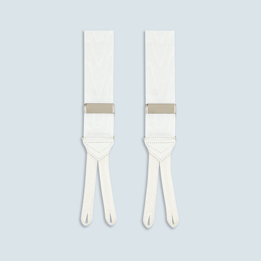 Turnbull & Asser White Adjustable Formal Braces with silver buckles and split leather ends, made in England, displayed on a light gray background.