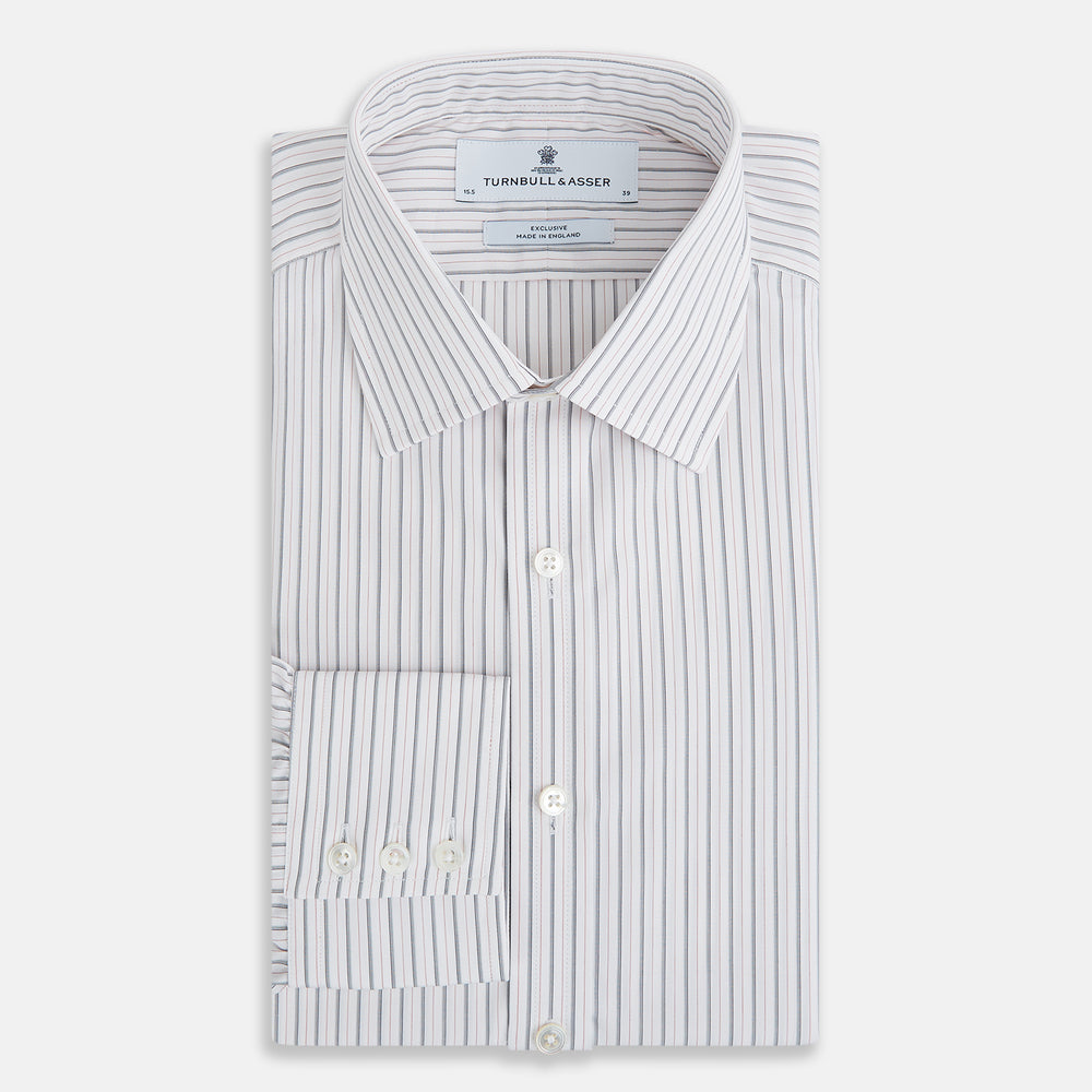 The Turnbull & Asser Midnight Blue and Red Ticking Stripe Mayfair Shirt features long sleeves, a pointed collar, buttoned cuffs, and fine Italian cotton—an essential men's wardrobe piece shown on a plain white background.