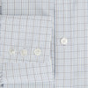 View 4 of product The Turnbull & Asser Navy and Blue Multi Grid Check Mayfair Shirt is a long-sleeve, button-up Italian cotton shirt with a collar and cuffs, featuring a blue grid check pattern, shown against a plain white background.