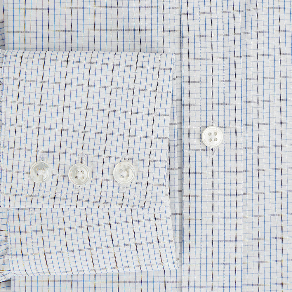 The Turnbull & Asser Navy and Blue Multi Grid Check Mayfair Shirt is a long-sleeve, button-up Italian cotton shirt with a collar and cuffs, featuring a blue grid check pattern, shown against a plain white background.