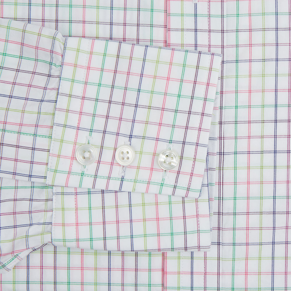 The Turnbull & Asser Multicoloured Double Grid Check Mayfair Shirt, made from organic cotton, features long sleeves, a collar, and a blue, green, and red grid check on white. The shirt is shown neatly laid flat against a white background.