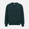 View 1 of product The Turnbull & Asser Forest Green Cashmere V-Neck Jumper features long sleeves, ribbed cuffs, collar, and hem. Shown against a white background, it's a classic knitwear piece ideal for layering.