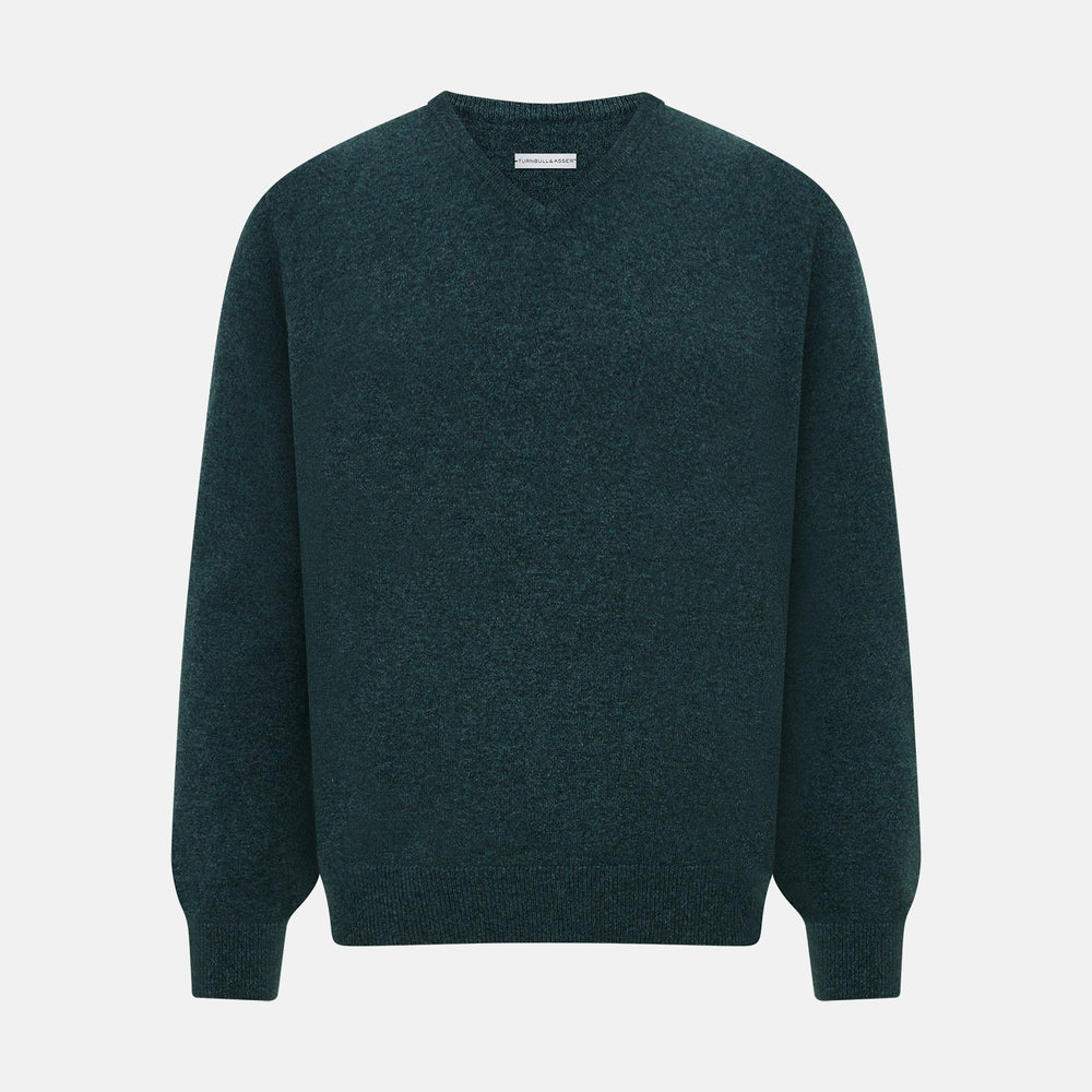 The Turnbull & Asser Forest Green Cashmere V-Neck Jumper features long sleeves, ribbed cuffs, collar, and hem. Shown against a white background, it's a classic knitwear piece ideal for layering.