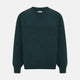 The Turnbull & Asser Forest Green Cashmere V-Neck Jumper features long sleeves, ribbed cuffs, collar, and hem. Shown against a white background, it's a classic knitwear piece ideal for layering.