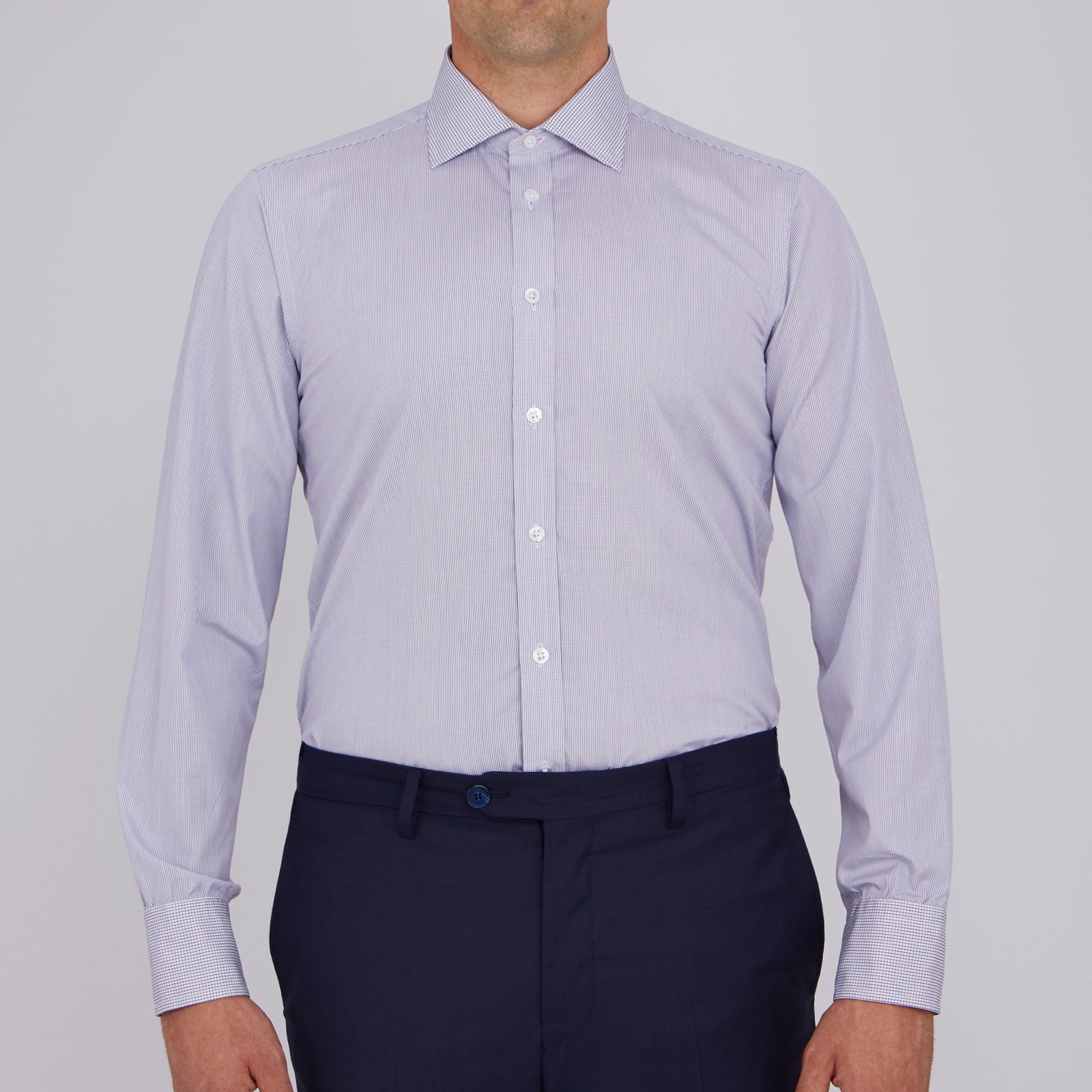 View 4 of product The Turnbull & Asser Slim Fit Blue Checked Shirt features long sleeves, contrasting white buttons, a regent collar, and distinct blue check pattern detailing on the cuff.