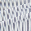 View 6 of product The Turnbull & Asser Navy Multi Stripe Mayfair Shirt, a pure cotton button-up with long sleeves and a collar, features thin vertical blue and white stripes and is displayed flat on a white background.