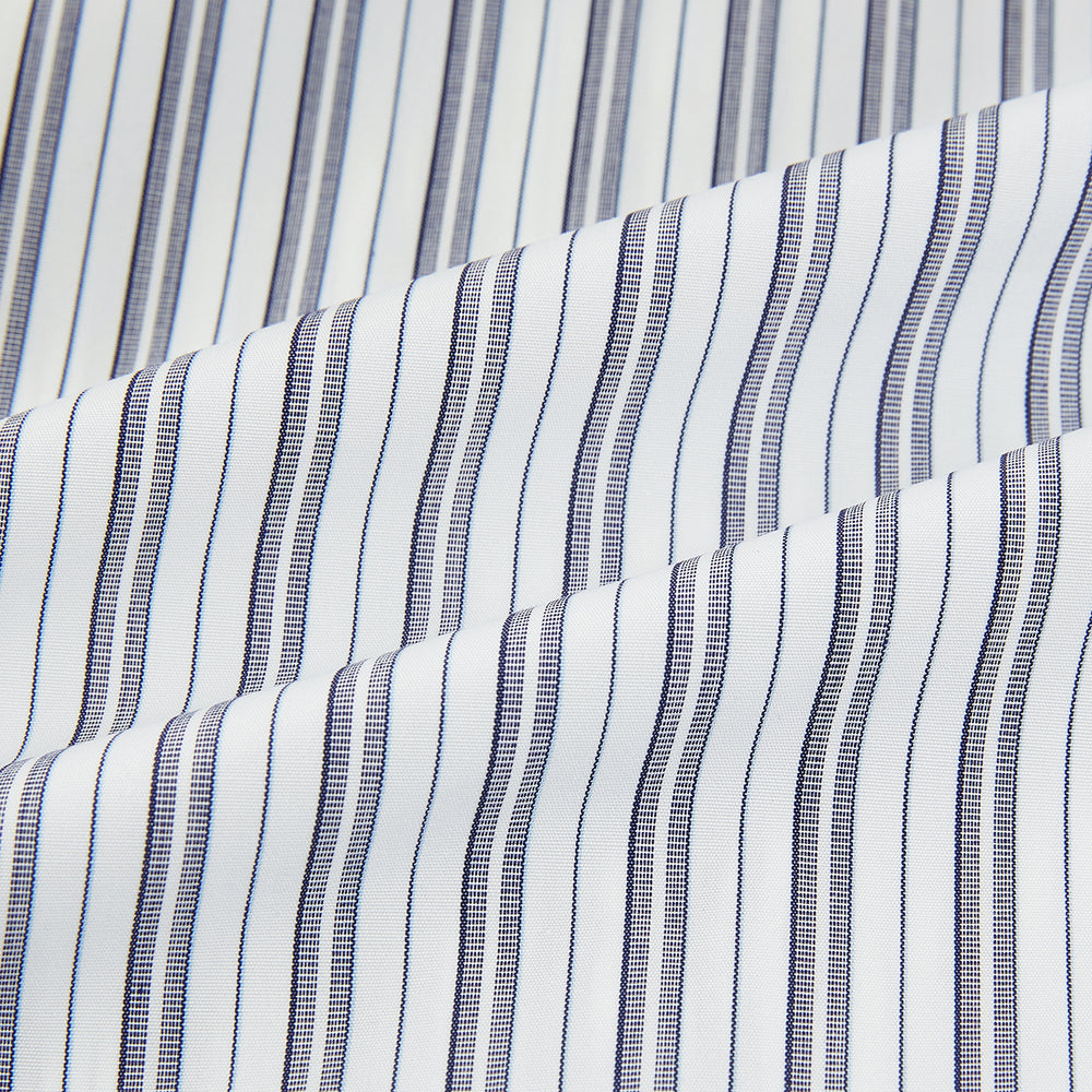 The Turnbull & Asser Navy Multi Stripe Mayfair Shirt, a pure cotton button-up with long sleeves and a collar, features thin vertical blue and white stripes and is displayed flat on a white background.