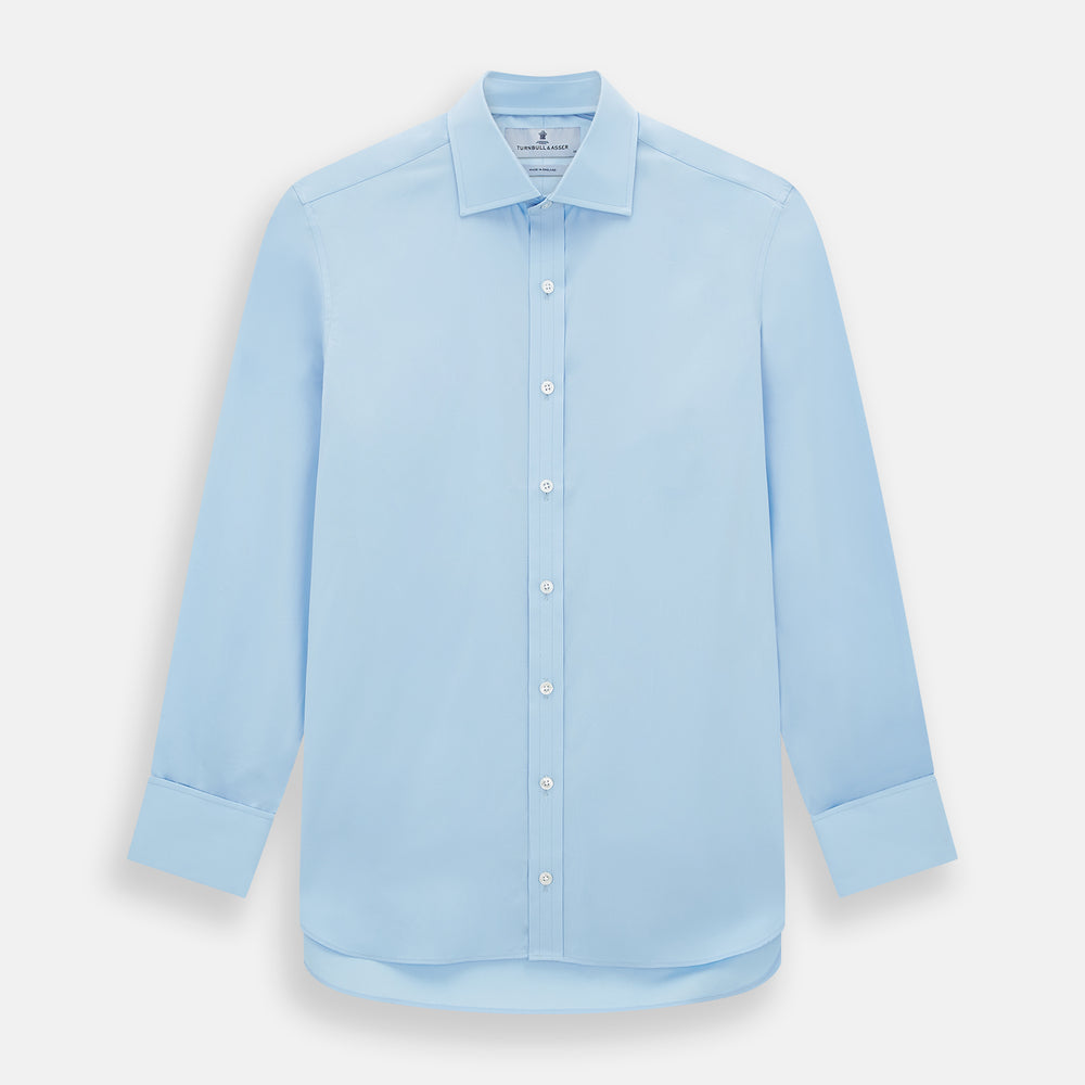 The Turnbull & Asser Dr. No Blue Cotton Shirt with cocktail cuffs, inspired by James Bond, features a classic collar and white buttons, displayed on a plain white background.