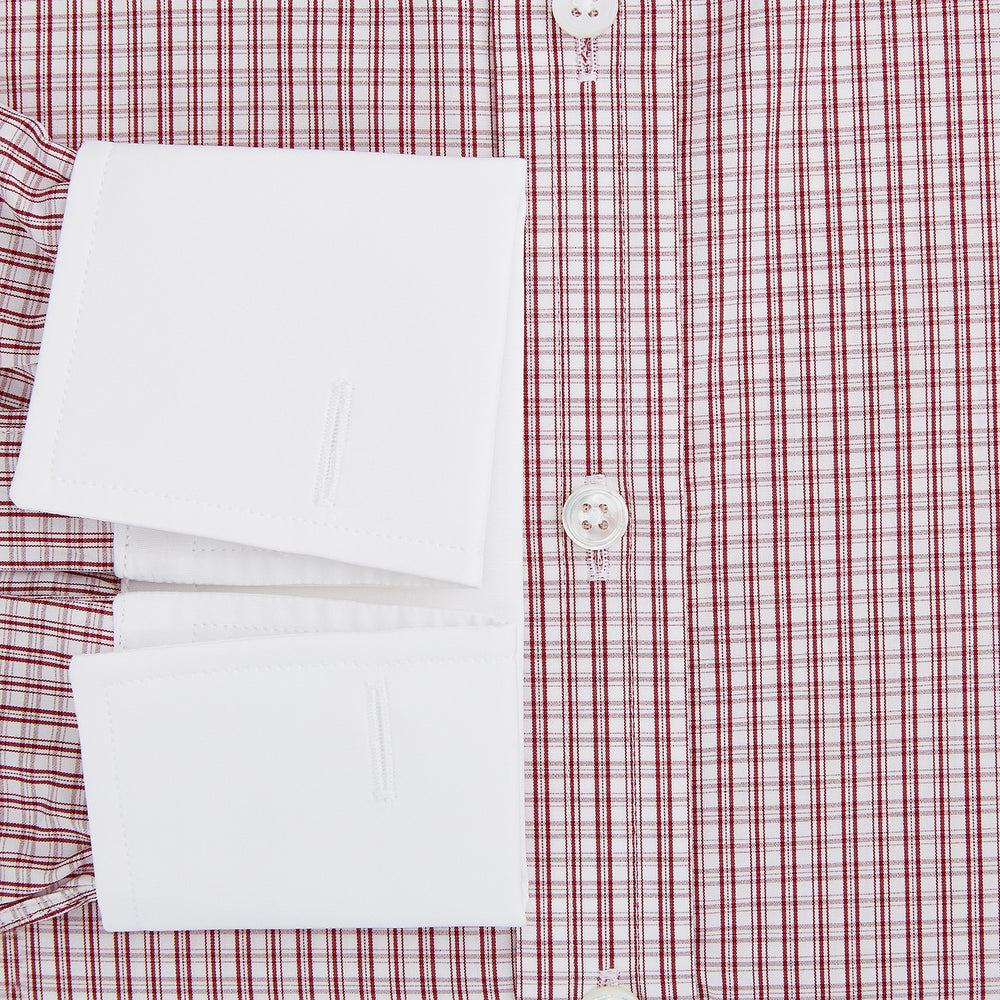 The Turnbull & Asser Red Micro Check Shirt features a crisp white contrast T&A collar and cuffs, crafted in Italian cotton. Timeless style is showcased against a plain white background, inspired by classic Turnbull & Asser designs.