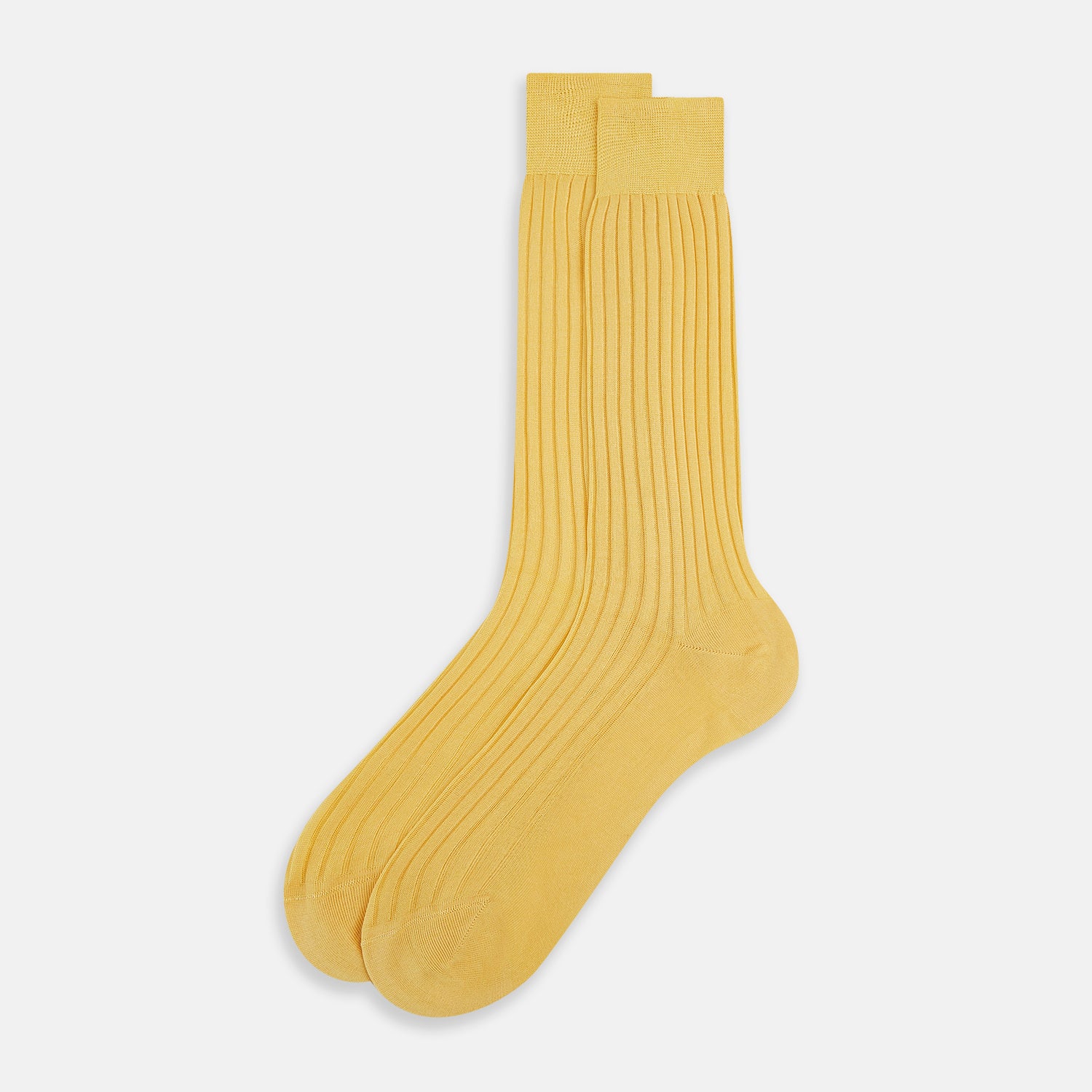 View 2 of product The Turnbull & Asser Banana Mid-Length Sock, made from mercerised Egyptian cotton with a hand-linked toe, is shown upright on a plain white background.