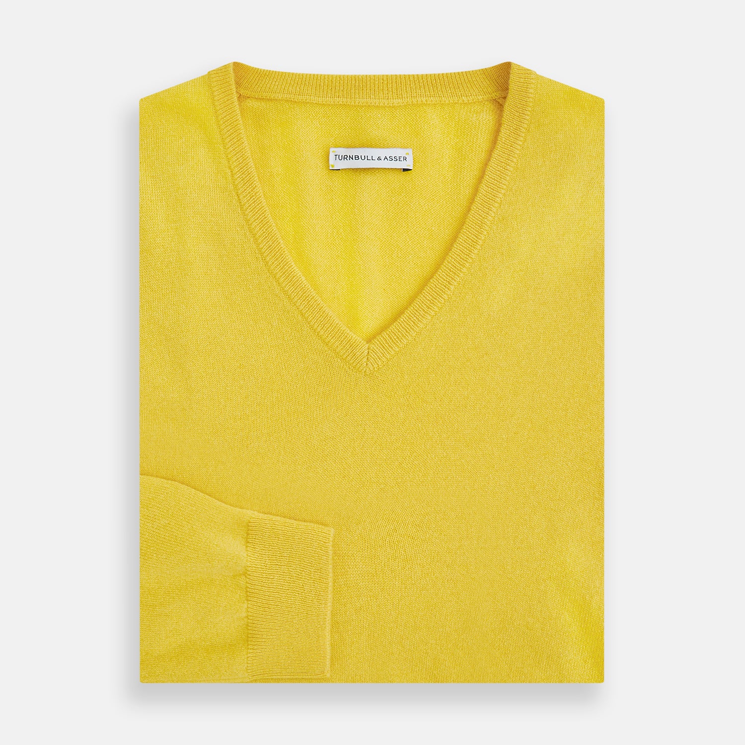 View 4 of product The Turnbull & Asser Canary Yellow Cashmere V-neck Jumper features long sleeves and ribbed cuffs and hem, shown against a white background.