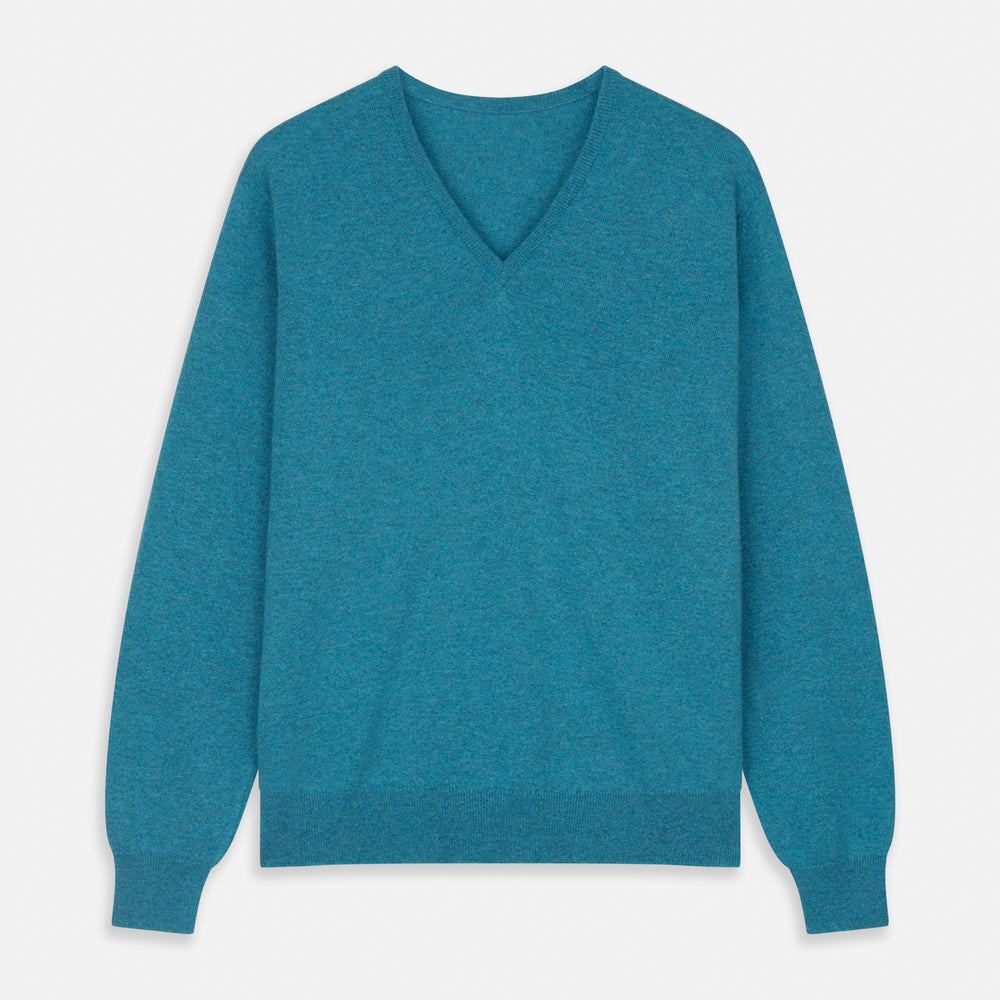 The Teal Paden V-Neck Jumper by Turnbull & Asser is a pure cashmere sweater in teal blue, featuring long sleeves with ribbed cuffs and hem, shown flat on a light gray background.
