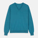 The Teal Paden V-Neck Jumper by Turnbull & Asser is a pure cashmere sweater in teal blue, featuring long sleeves with ribbed cuffs and hem, shown flat on a light gray background.