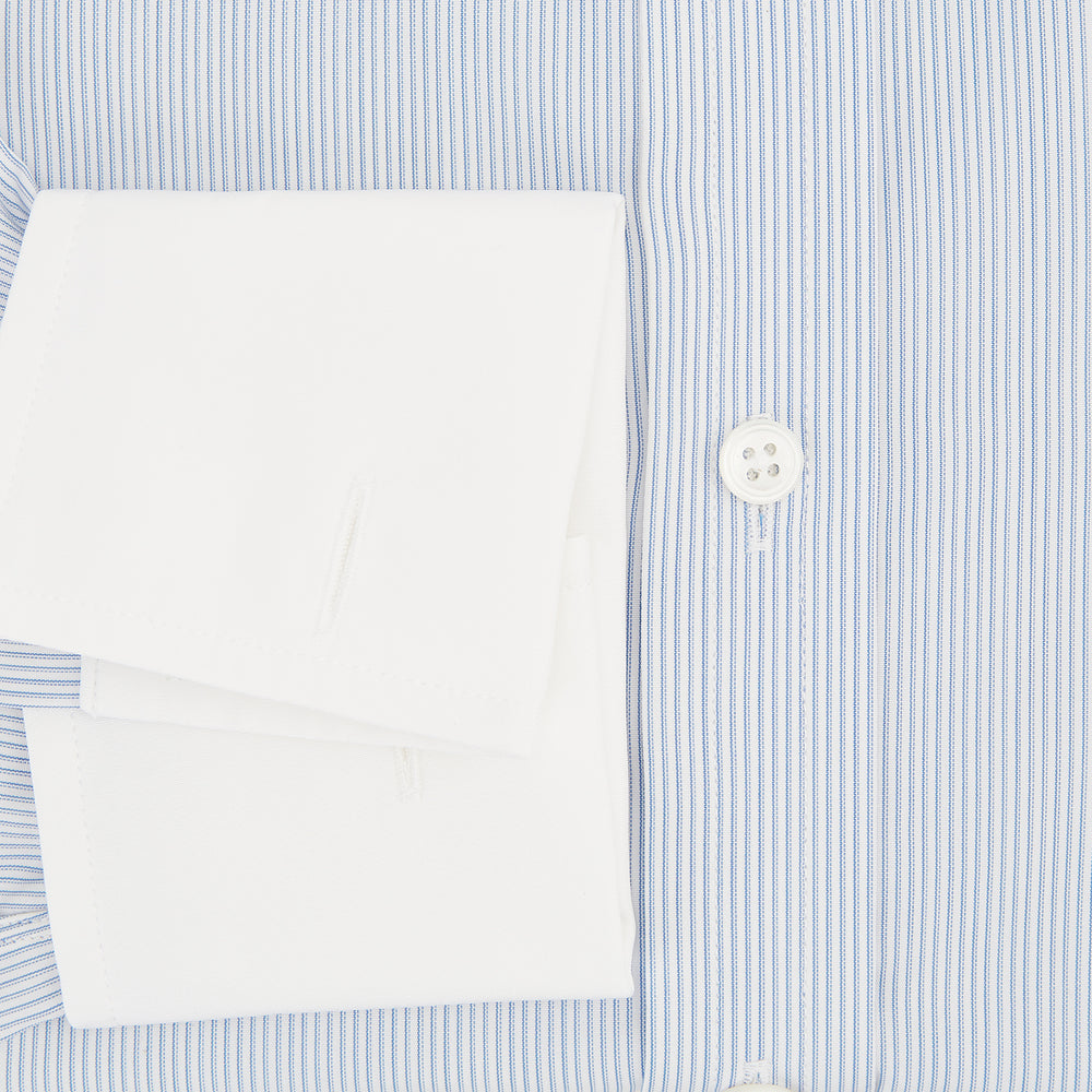 Turnbull & Asser Sky Blue Hairline Multi Stripe Shirt features a contrasting T&A collar and cuffs, long sleeves, and button-down front. Displayed against a plain white background.