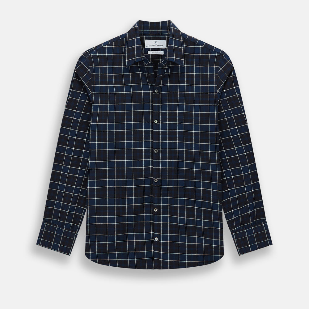 The Turnbull & Asser Navy and White Check Windsor Shirt features a long-sleeve design with a navy base and white check pattern, showcasing British craftsmanship and displayed on a white background.
