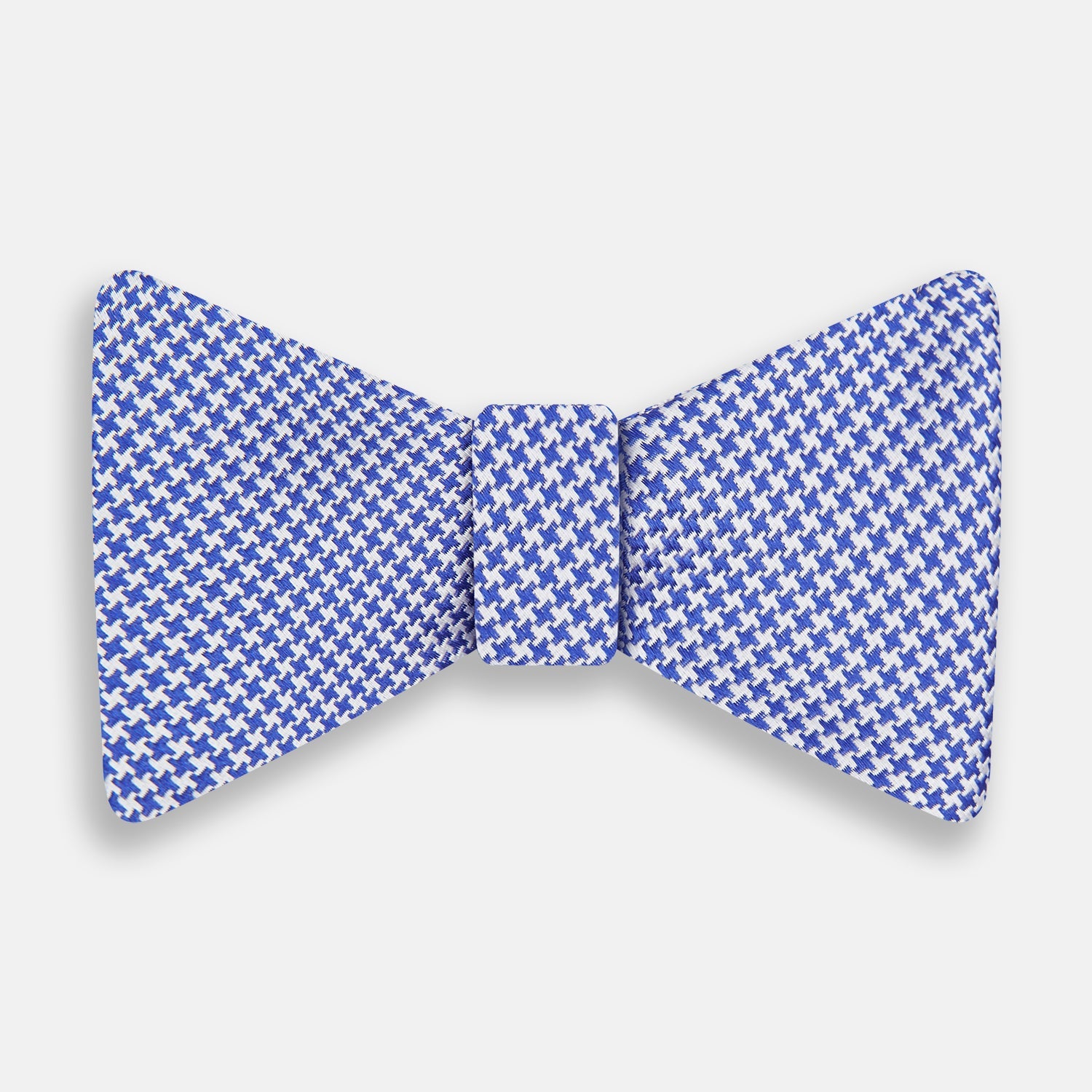 View 1 of product The Turnbull & Asser Navy and White Houndstooth Silk Bow Tie features a neatly centered knot, shown on a white background—an elegant formalwear accessory.