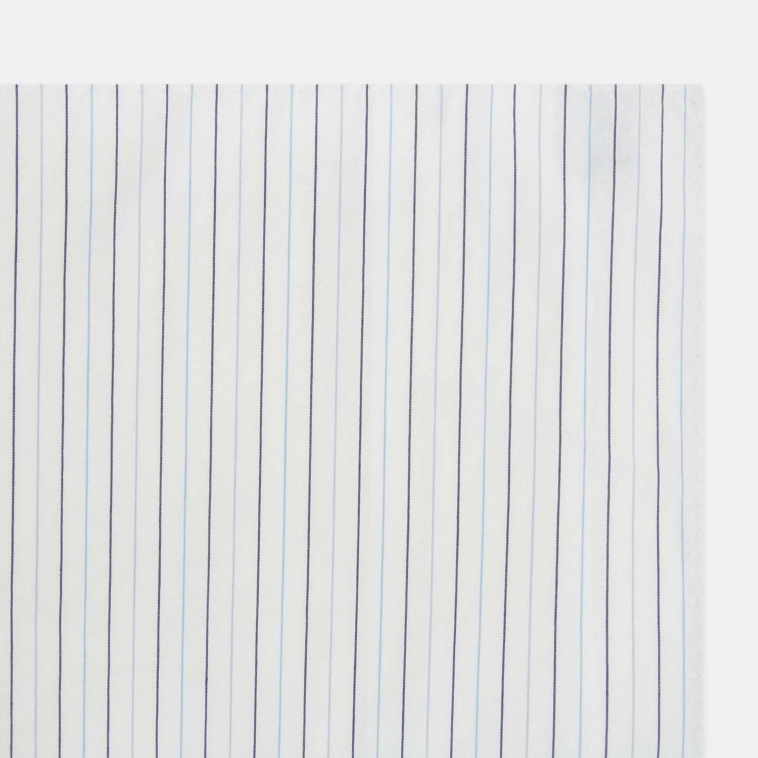 View 2 of product The Turnbull & Asser Navy and Blue Wide Pinstripe Hand-Rolled Handkerchief features bold vertical stripes and is shown flat on a white background.