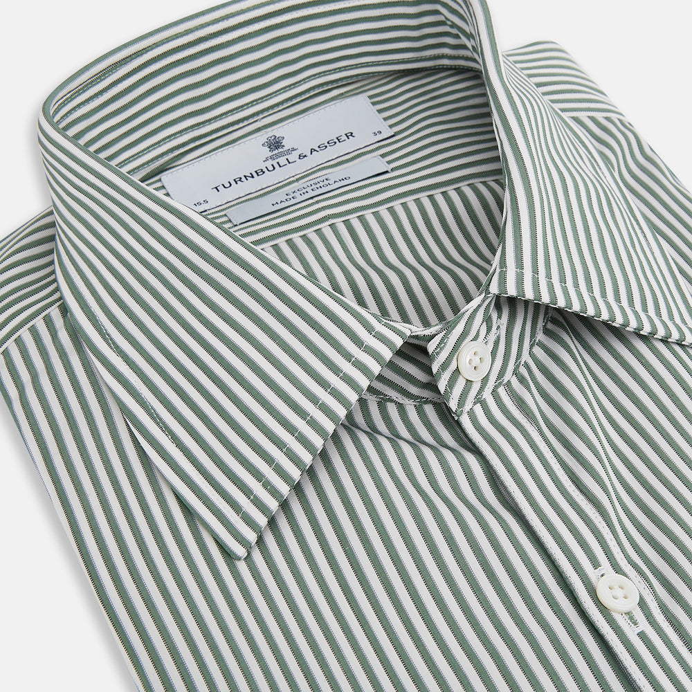 The Melon Green Halo Stripe Westminster Shirt by Turnbull & Asser, featuring thin green and white stripes and a classic Turnbull collar, is displayed against a plain white background—a testament to refined British craftsmanship.