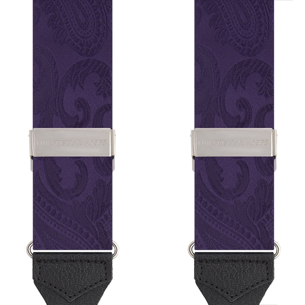Turnbull & Asser's Purple Paisley Adjustable Silk Braces feature black leather loops and silver adjusters, offering refined sartorial style. Shown against a white background.
