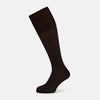 View 1 of product The Turnbull & Asser Dark Chocolate/Pale Blue Polka Dot Long Sock is shown as a single over-the-calf sock with pale blue dots on dark brown, displayed against a plain white background.