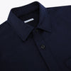 View 2 of product The Turnbull & Asser Midnight Blue Highbury Overshirt, featuring long sleeves, a collar, and a single chest pocket, is shown laid flat against a white background.