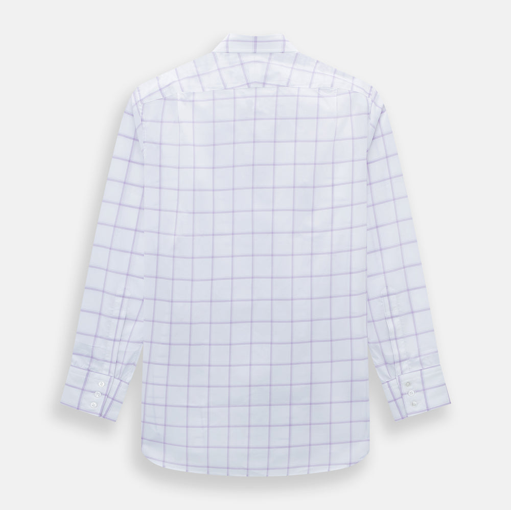 The Turnbull & Asser Lilac Grid Check Mayfair Shirt is a long-sleeve, button-up style crafted from Italian cotton with a white base and lilac grid check pattern, shown on a plain white background.