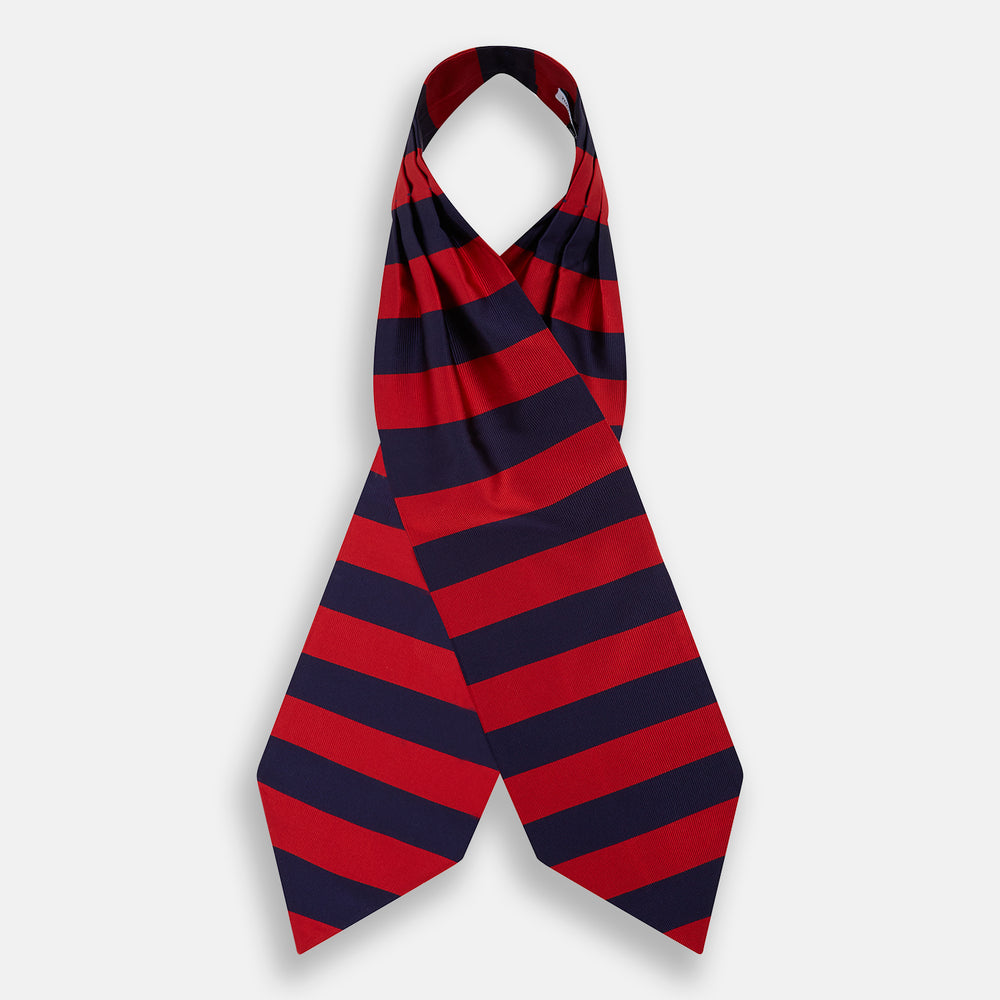 The Turnbull & Asser Wide Red Stripe and Navy Silk Cravat features bold diagonal stripes, adding a refined touch of British elegance to any ensemble.