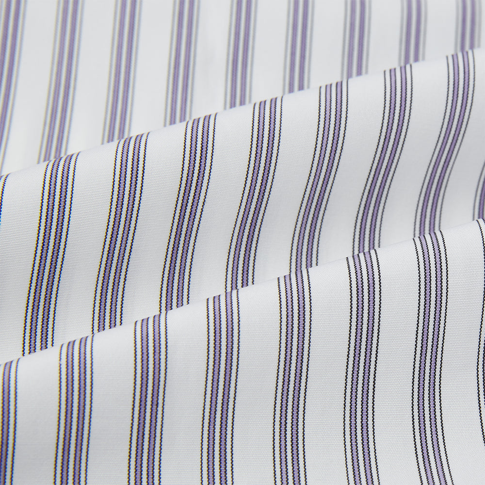 The Turnbull & Asser Purple Multi Stripe Quarzo Nightshirt features a collared, button-front design with a chest pocket and vertical white and light gray stripes, shown laid flat on a white background.