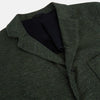 View 2 of product The Turnbull & Asser Forest Green Linen Blend Cambridge Blazer features British tailoring with notch lapels, two front buttons, a chest pocket, and two lower pockets, displayed on a plain white background.