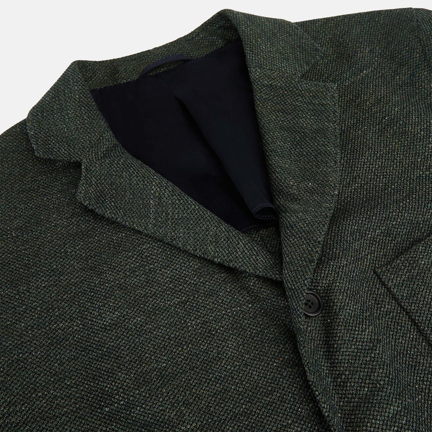 View 2 of product The Turnbull & Asser Forest Green Linen Blend Cambridge Blazer features British tailoring with notch lapels, two front buttons, a chest pocket, and two lower pockets, displayed on a plain white background.