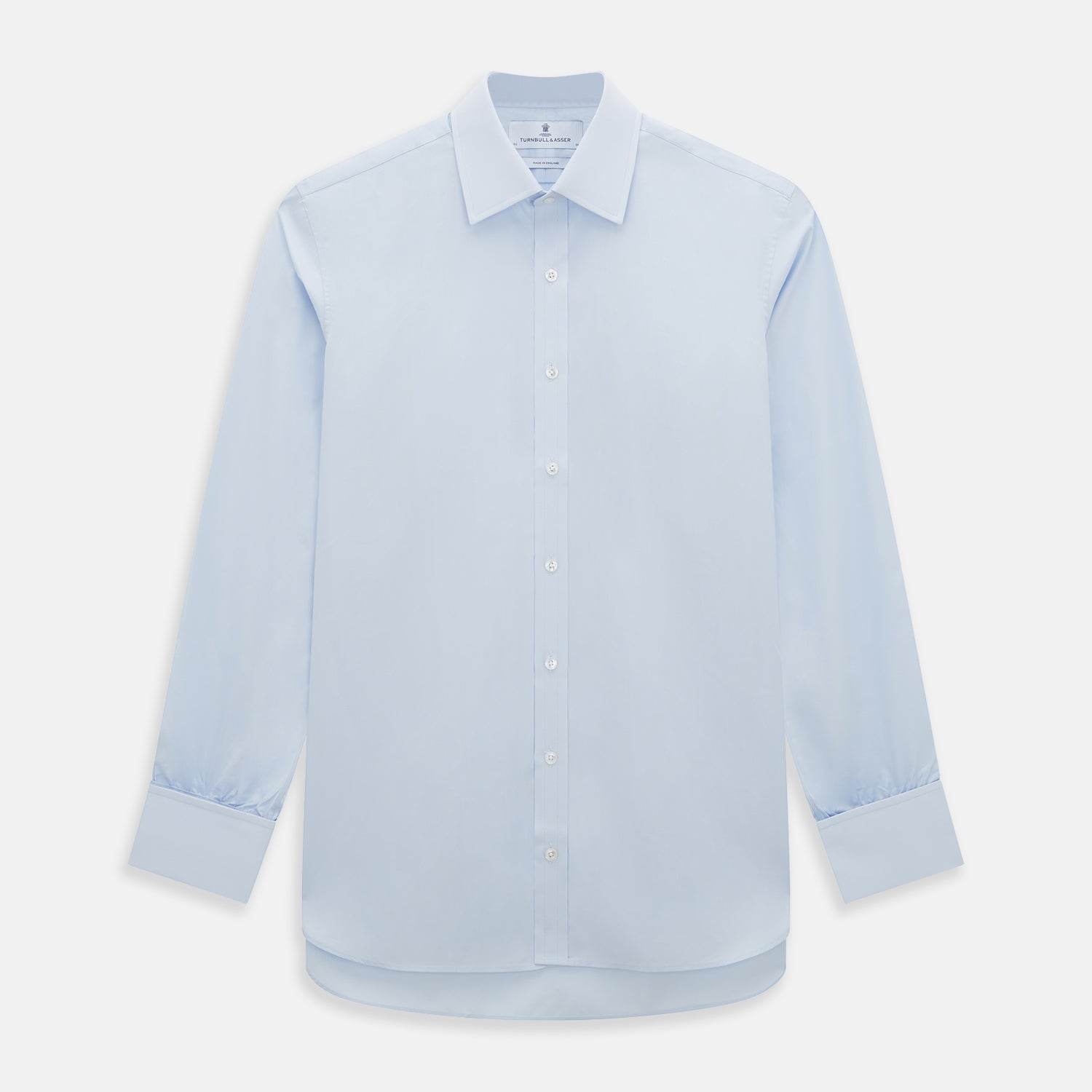 View 1 of product The Turnbull & Asser Light Blue Mayfair Shirt features white buttons, a classic collar, and buttoned cuffs—styled flat on a white background, it’s ideal for minimalist outfits or pairing with bold ties.