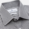 View 2 of product The Turnbull & Asser Grey Gingham Check Cotton Melange Regular Fit Mayfair Shirt, shown flat against a white background, offers a classic designer look with its small black and white check pattern and button-down design.