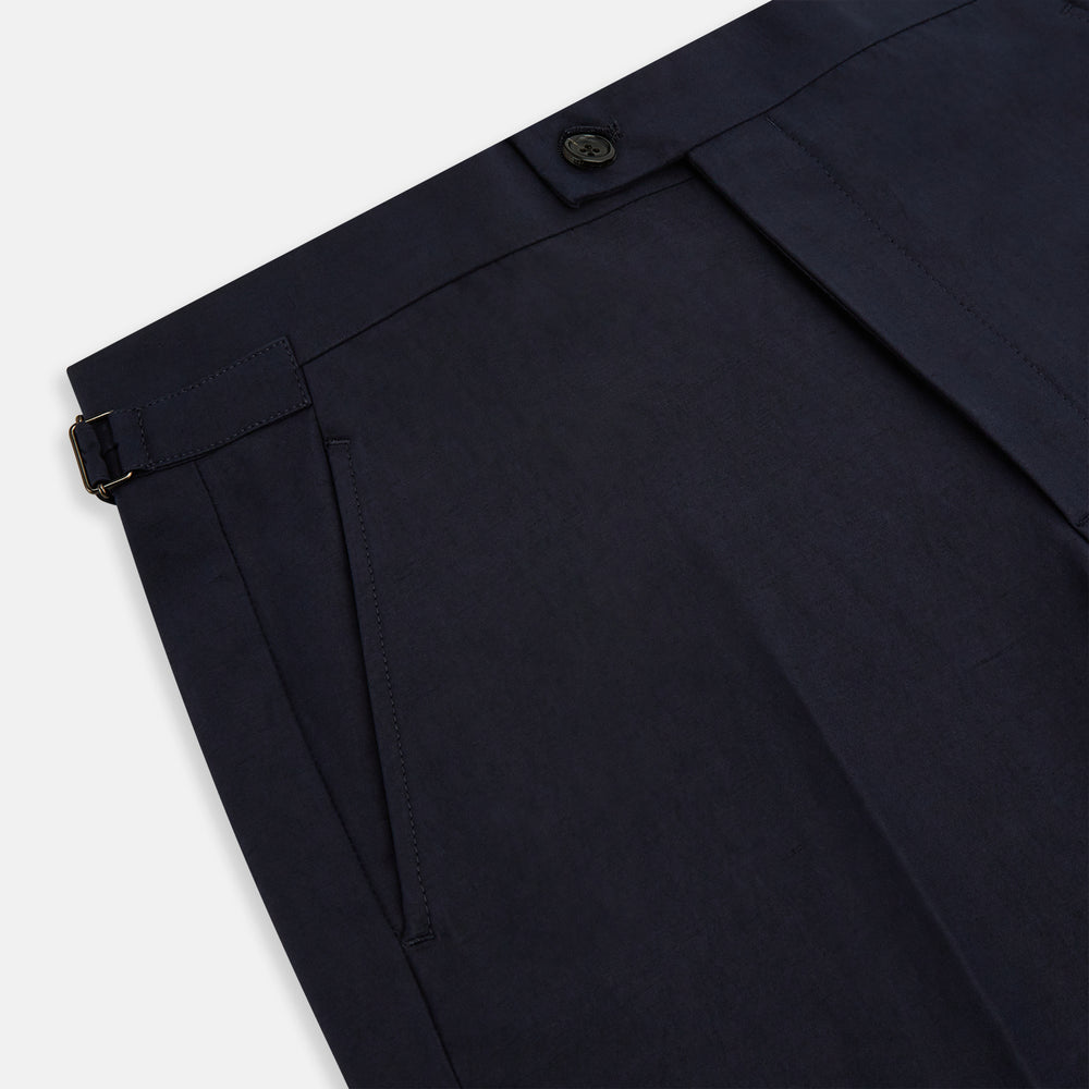 Turnbull & Asser Navy Linen Henry Trousers feature a button closure and pressed front creases, ideal as formal navy trousers, and are shown against a plain white background.